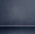 Empty shelf on a dark grey concrete wall. Background template. Square mockup Royalty Free Stock Photo