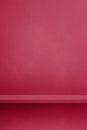 Empty shelf on a magenta pink concrete wall. Background template. Vertical mockup Royalty Free Stock Photo
