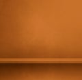 Empty shelf on an orange brown concrete wall. Background template. Square mockup Royalty Free Stock Photo