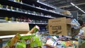 Empty shelves in the store. Bankruptcy of supermarket, the largest retailer. Clutter, trash and scattered goods on the dirty