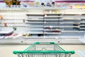 Empty shelves in supermarket store due to novel coronavirus covid-19 outbreak panic in thailand Royalty Free Stock Photo