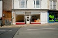A empty shop building with a window on the front Royalty Free Stock Photo