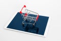 Empty shopping cart on digital tablet, on white background. Online shopping Royalty Free Stock Photo