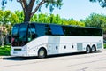 An empty shuttle bus made by Van Hool waits for passengers Royalty Free Stock Photo