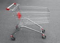 Empty sidewise supermarket shopping cart