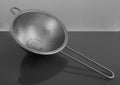 Empty sieve strainer stainless metal with handle Royalty Free Stock Photo
