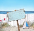 Empty Signboard and Wooden Fence on Beach