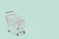 Empty silver colored shopping cart