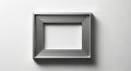 Empty Silver Picture Frame on White Textured Wall - Copy Space Royalty Free Stock Photo