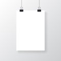 Empty A4 sized vector paper frame mockup hanging with paper clip. Realistic empty white poster template. Royalty Free Stock Photo