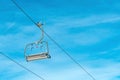 Empty ski chair lift in winter resort Royalty Free Stock Photo