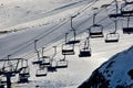 Empty ski lift above the ski slope. Royalty Free Stock Photo