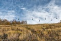 Empty ski lift in an alpine meadow Royalty Free Stock Photo