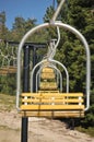 Empty ski lift chairs in a row Royalty Free Stock Photo