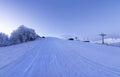 Dawn on an empty ski slope. Panorama. Royalty Free Stock Photo