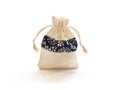 Empty small cotton bag with string on white background Royalty Free Stock Photo