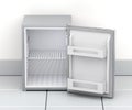 Empty small refrigerator Royalty Free Stock Photo