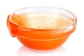 Empty small transparent glass round bowl with stains and smudges of tomato ketchup inside isolated on white background Royalty Free Stock Photo