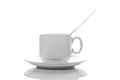 Empty small white porcelain coffee Cup with a spoon on a white saucer side view isolated on a white background Royalty Free Stock Photo