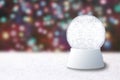 Empty Snow Globe on a Christmas Blurry Background