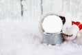 Empty Snow Globe with Copy Space Surrounded by Santa Hat Royalty Free Stock Photo