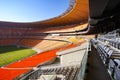 Empty Soccer Football stadium with orange seating