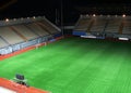 Empty soccer stadium in the night