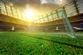 Empty soccer stadium in sunlight