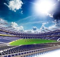 Empty soccer stadium in sunlight Royalty Free Stock Photo