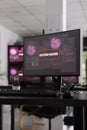 Empty software office displaying critical error message flashing on pc display