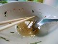 Empty soup bowl with spoon and chopsticks Royalty Free Stock Photo