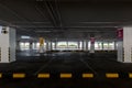 Empty space car park interior at afternoon.Indoor parking lot.interior of parking garage with car and vacant parking lot in parkin Royalty Free Stock Photo