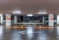 Empty space car park interior at night. Indoor parking lot. Royalty Free Stock Photo