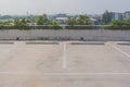 Empty space of car parking lot on rooftop floor of buildings. Royalty Free Stock Photo