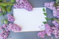 Empty space notepad list with lilac bunch flowers