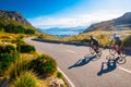 Empty Space. Sporty friends on bicycle on sunset. Couple cyclist along coast. Sport in Nature background road biker in sunset