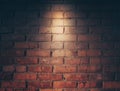 Empty space of Studio dark room black brick wall grunge texture background. Spotlight on a brick wall Royalty Free Stock Photo