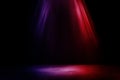 Studio dark room with fog or mist and lighting effect red and blue on concrete floor grunge texture background.