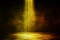 Studio dark room with golden spot lighting effect and fog or mist on concrete floor grunge texture background. Royalty Free Stock Photo