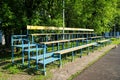 Empty spectator stand on an amateur soccer field