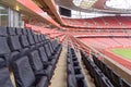 Empty sports stadium with red seats Royalty Free Stock Photo