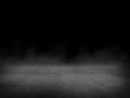 Empty spot lit concrete floor, dark background. Royalty Free Stock Photo