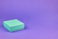 Empty square box of turquoise color. A box for jewelry or a gift. The layout of a small gift box Royalty Free Stock Photo