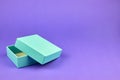 Empty square box of turquoise color. A box for jewelry or a gift. The layout of a small gift box Royalty Free Stock Photo