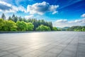 Empty square floor and green forest natural landscape Royalty Free Stock Photo