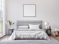 Empty square frame on white wall in modern neutral gray bedroom interior.