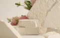 Empty stack of gypsum stones platform podium on beige background. Minimal empty display product presentation scene