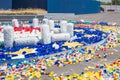 Empty stack plastic bottles and color caps, lids to recycle