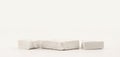 Empty stack of stones platform podium on light beige background. Minimal empty display product presentation scene