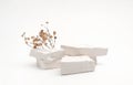 Empty stack of stones platform podium on light gray background. Minimal empty display product presentation scene